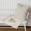 Striped Pillow With Tied Rabbit Slip Cover